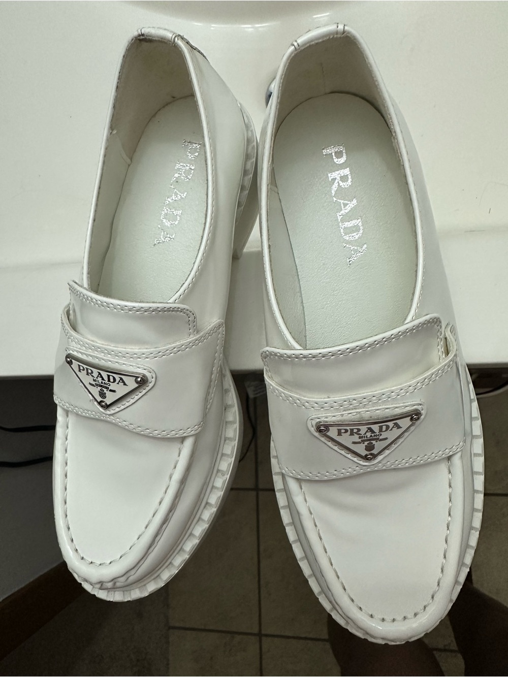 White Leather Women's Loafers with Triangle Metal Logo
